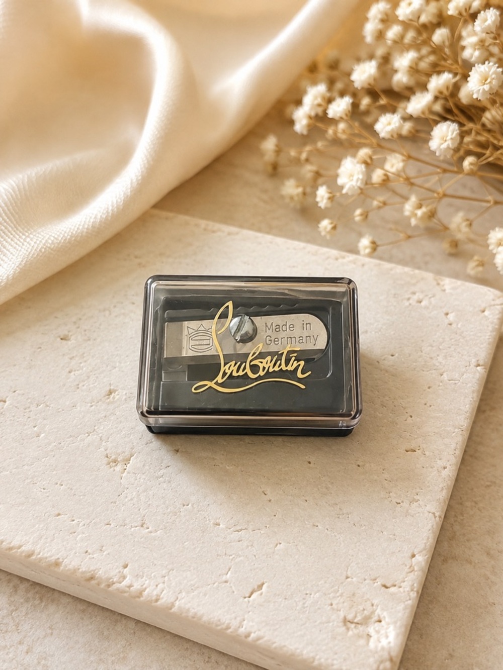Christian Louboutin Black and Gold Sharpener